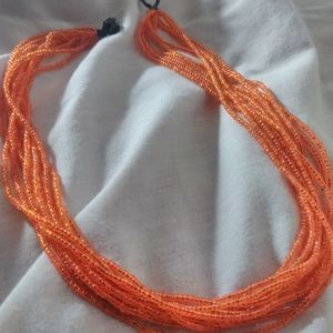 Orange Beaded Necklace/W black Clasp..🖤
